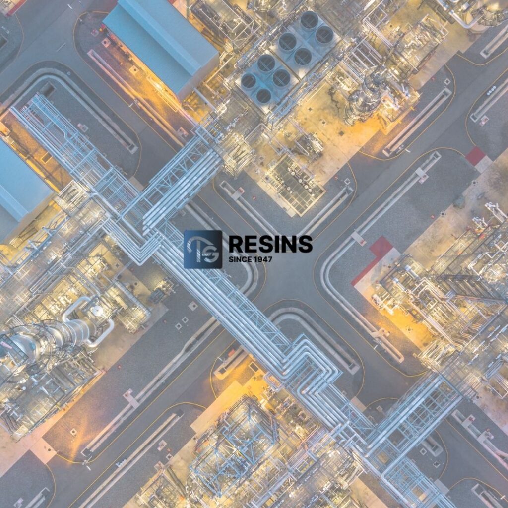 TS Resins logo over an aerial view of a chemical manufacturing plant